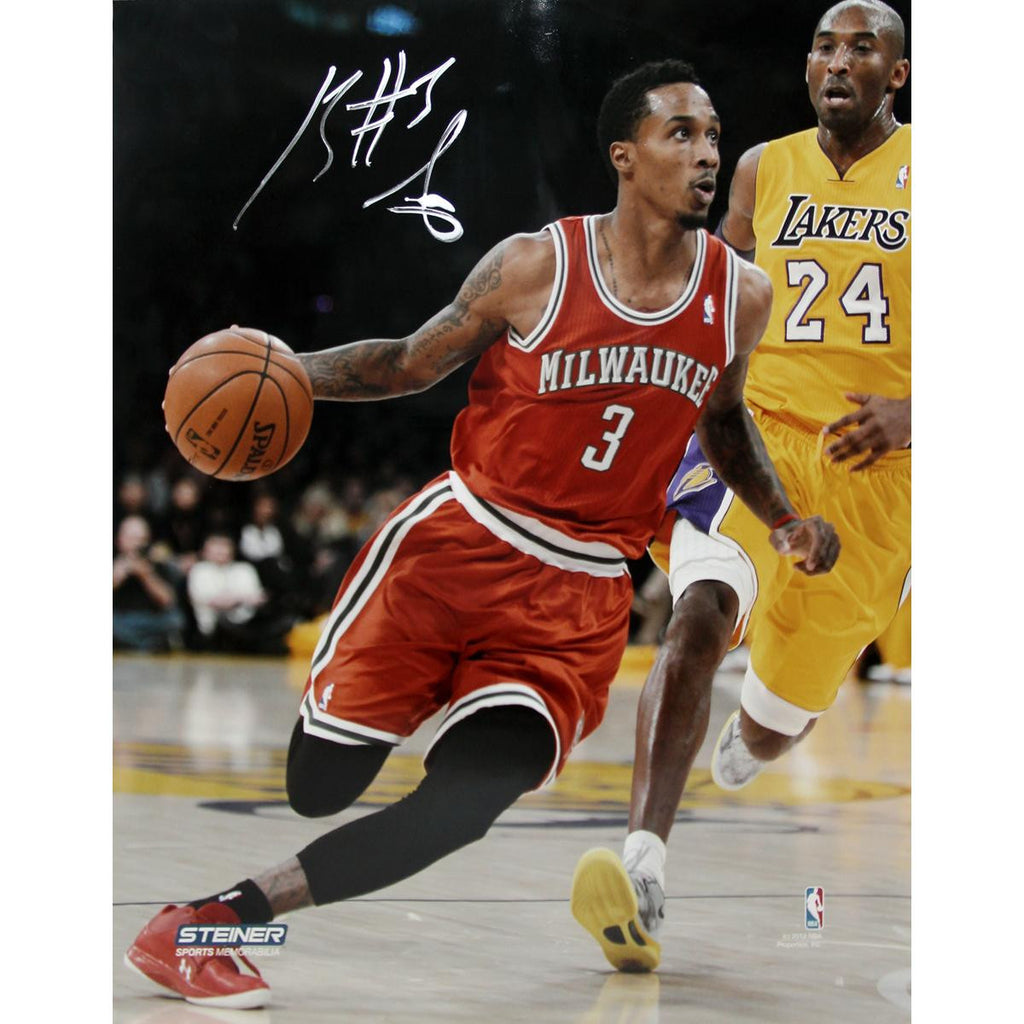 Brandon Jennings Drives Passed Kobe Bryant Signed 8x10 Photo(Getty 159553698)