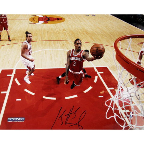 Brandon Jennings Shoots Against Chicago Bulls Signed 8x10 Photo (Getty 159212959)