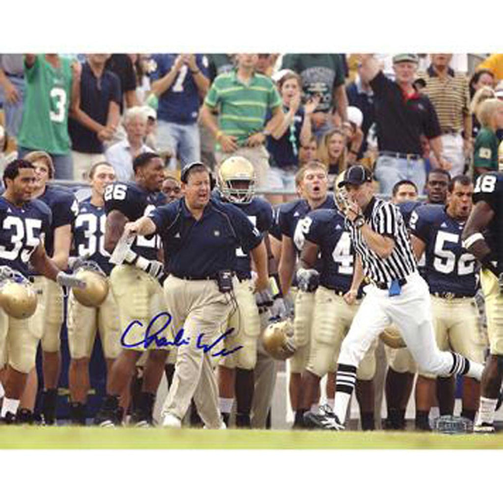 Charlie Weis Yelling from Sidelines with Team in the Background 8x10 Photo