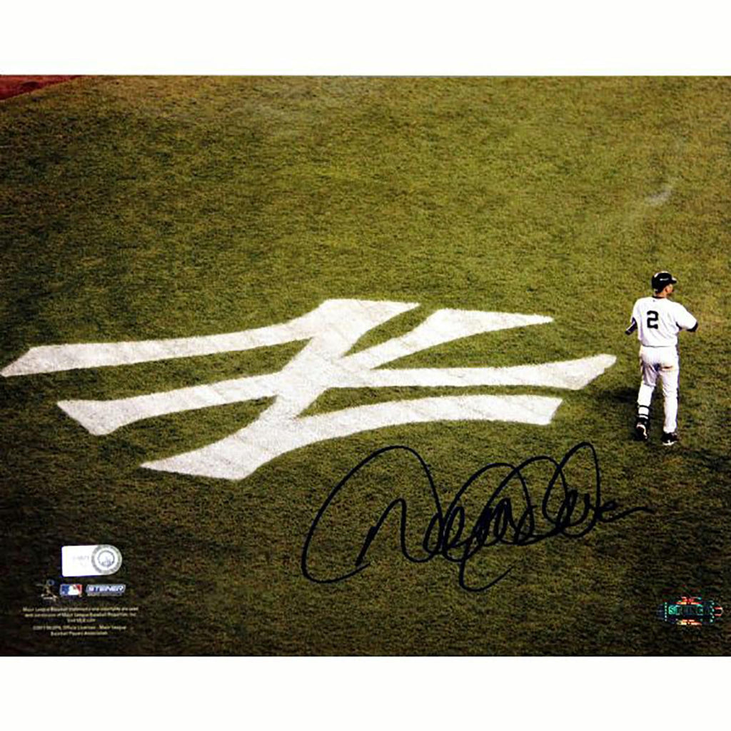 Derek Jeter On Field with Yankee Emblem Horizontal 8x10 Photo (MLB Auth)