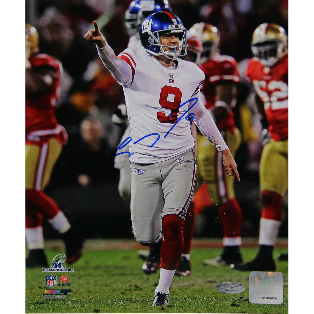 Lawrence Tynes Celebrating vs. San Francisco Vertical 8x10 Photo